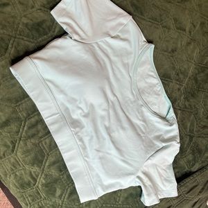 Baby blue open back NVGTN crop size medium.